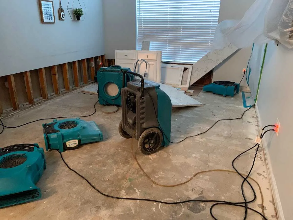 Dehumidifier in flood-cut room for Water Damage Restoration in Lapeer